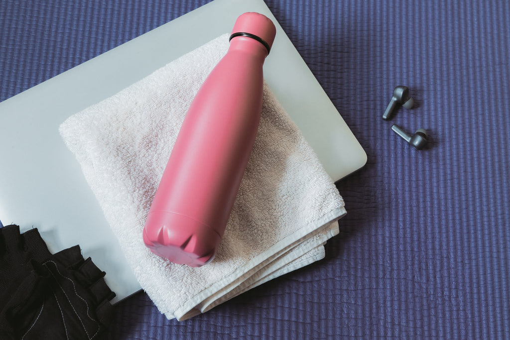 Steel Water Bottle on a yoga mat
