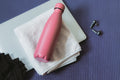 Steel Water Bottle on a yoga mat